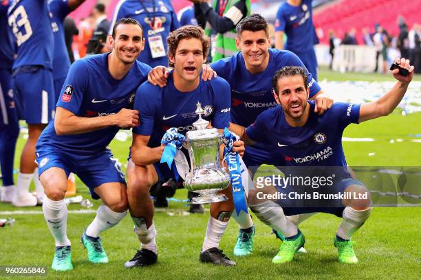 Davide Zappacosta, Marcos Alonso, Alvaro Morata and Cesc Fabregas, all of Chelsea, celebrate with the FA Cup trophy after the Emirates FA Cup Final...