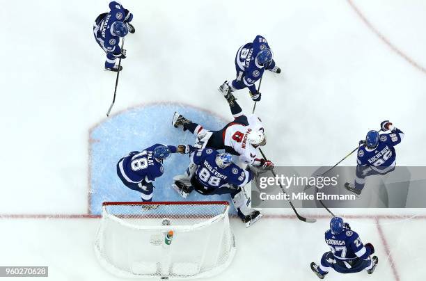 Andrei Vasilevskiy of the Tampa Bay Lightning stops a shot from Alex Ovechkin of the Washington Capitals in Game Five of the Eastern Conference...