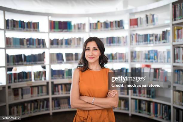 portrait of a beautiful librarian - librarian stock pictures, royalty-free photos & images