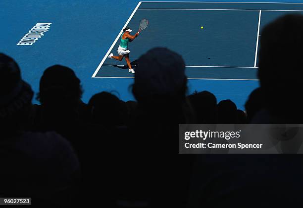 Casey Dellacqua of Australia plays a backhand in her third round match against Venus Williams of the United States of America during day six of the...