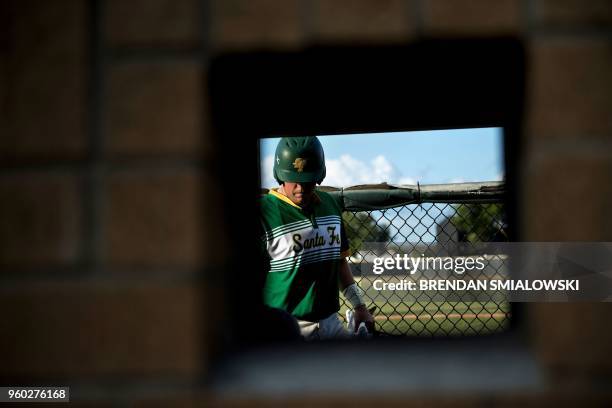 Santa Fe High School baseball player wears a tribute to a shooting victim during a makeup game a day after the mass shooting May 19, 2018 in Deer...