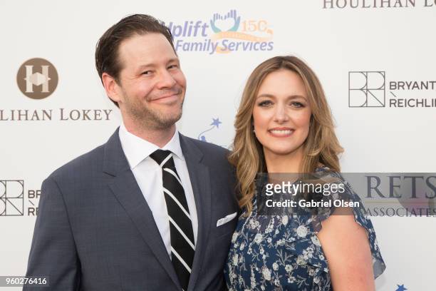 Ike Barinholtz and Erica Hanson arrive for the Uplift Family Services at Hollygrove's 7th Annual Norma Jean Gala at Hollygrove Campus on May 19, 2018...
