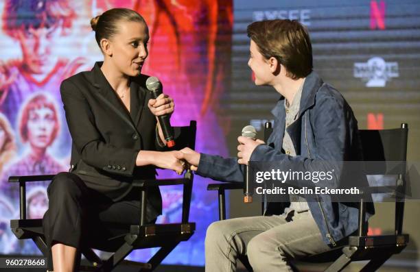 Millie Bobby Brown and Noah Schnapp speak on stage at #NETFLIXFYSEE event for "Stranger Things" at Netflix FYSEE at Raleigh Studios on May 19, 2018...