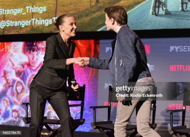 Millie Bobby Brown and Noah Schnapp speak on stage at #NETFLIXFYSEE event for "Stranger Things" at Netflix FYSEE at Raleigh Studios on May 19, 2018...