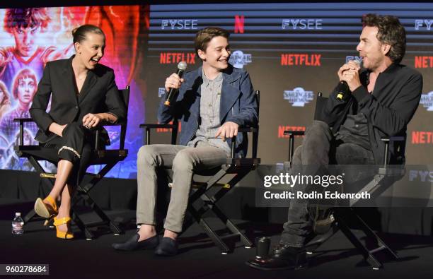 Millie Bobby Brown, Noah Schnapp, and director Shawn Levy speak on stage at #NETFLIXFYSEE event for "Stranger Things" at Netflix FYSEE at Raleigh...