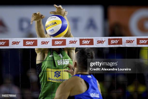 Andre Loyola Stein of Brazil in action during the main draw semifinals match against Piotr Kantor and Bartosz Losiak of Poland at Meia Praia Beach...