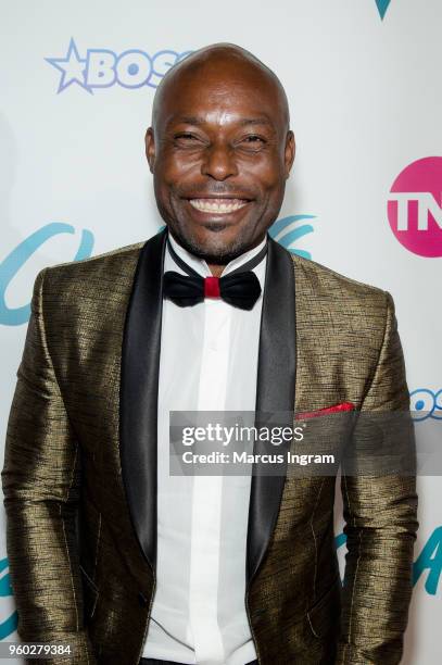 Actor Jimmy Jean-Louis attends 'Claws' Season 2 Atlanta premiere at Regal Atlantic Station on May 19, 2018 in Atlanta, Georgia.