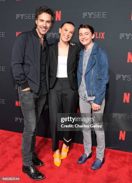 Director Shawn Levy, Millie Bobby Brown and Noah Schnapp attend The "Stranger Things 2" Panel At Netflix FYSEE on May 19, 2018 in Los Angeles,...