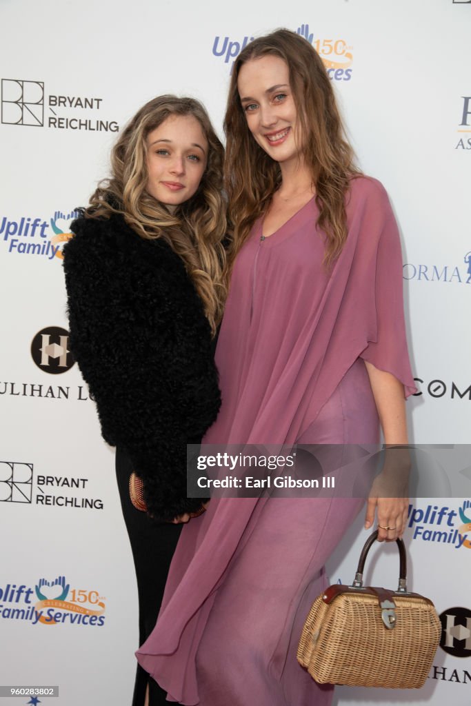 Carson Meyer and Allie Crow Buckley attend Uplift Family Services At