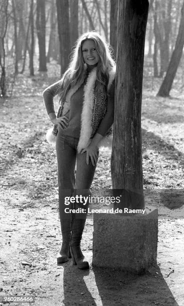 Brigitte Bardot on the set of "Don Juan 73" directed by Roger Vadim and wearing a fur cardigan, created by Jean Bouquin, ,