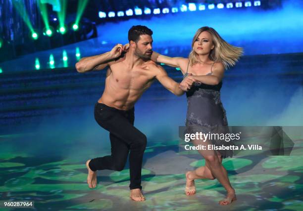 Pro Surfer Francisco Porcella and his dance partner Anastasia Kuzmina perform on the Italian TV show 'Ballando Con Le Stelle' at RAI Auditorium on...