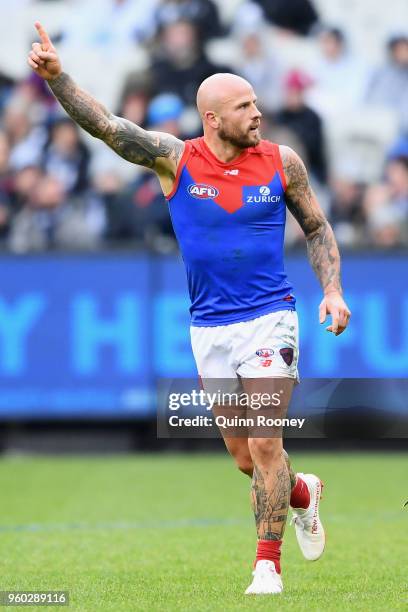 Nathan Jones of the Demons celebrates kicking a goal during the round nine AFL match between the Carlton Blues and the Melbourne Demons at Melbourne...