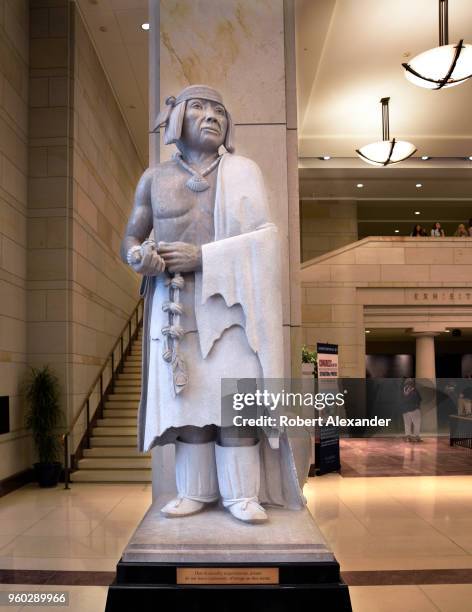 Marble statue of Po'pay by native American artist Cliff Fragua stands in the U.S. Capitol Visitor Center in Washington, D.C. Po'pay was born circa...