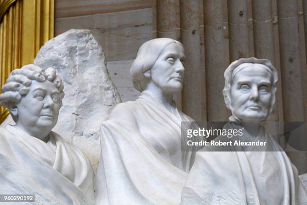 Stone sculpture by Adelaide Johnson in the Rotunda of the U.S. Capitol in Washington, D.C. Honors pioneers for women's suffrage. Depicted from left...