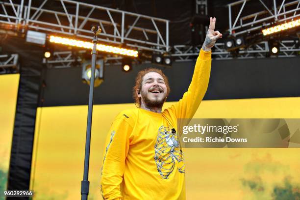 Rapper Post Malone performs at Infield Fest prior to the 143rd Preakness Stakes at Pimlico Race Course on May 19, 2018 in Baltimore, Maryland.