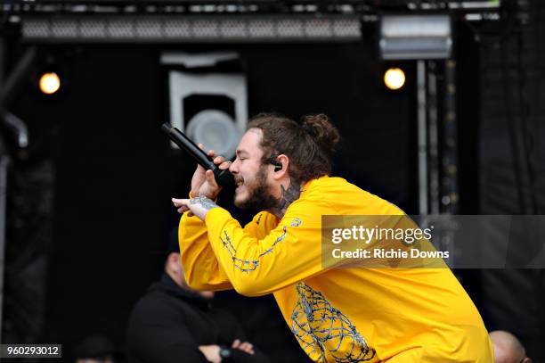 Rapper Post Malone performs at Infield Fest prior to the 143rd Preakness Stakes at Pimlico Race Course on May 19, 2018 in Baltimore, Maryland.