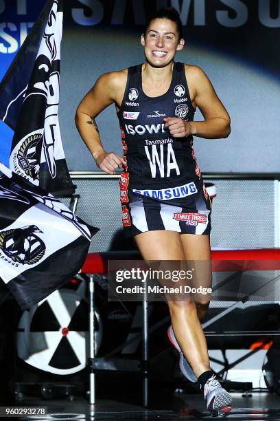 Madi Robinson of the Magpies runs out during the round four Super Netball match between the Magpies and the Lightning at Margaret Court Arena on May...