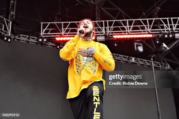 Rapper Post Malone performs at Infield Fest prior to the 143rd Preakness Stakes at Pimlico Race Course on May 19, 2018 in Baltimore, Maryland.