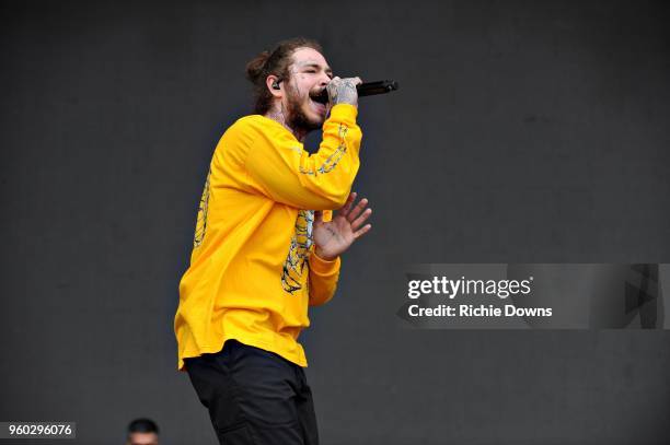 Rapper Post Malone performs at Infield Fest prior to the 143rd Preakness Stakes at Pimlico Race Course on May 19, 2018 in Baltimore, Maryland.