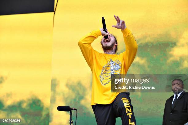 Rapper Post Malone performs at Infield Fest prior to the 143rd Preakness Stakes at Pimlico Race Course on May 19, 2018 in Baltimore, Maryland.