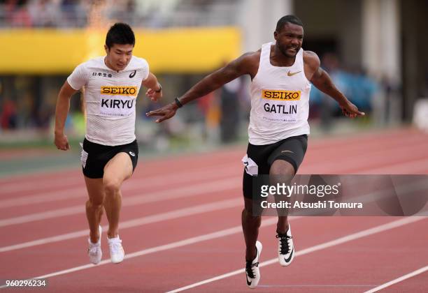 Justin Gatlin of the United States crosses the finish line to win the Men's 100m during the IAAF Golden Grand Prix at Yanmar Stadium Nagai on May 20,...