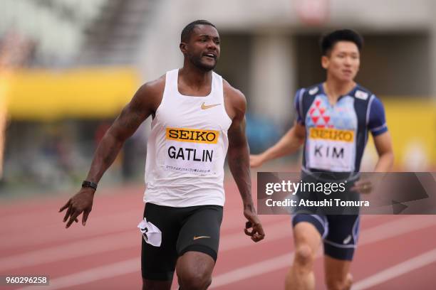 Justin Gatlin of the United States celebrates winning the Men's 100m during the IAAF Golden Grand Prix at Yanmar Stadium Nagai on May 20, 2018 in...