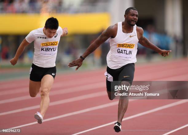 Justin Gatlin of the United States crosses the finish line to win the Men's 100m during the IAAF Golden Grand Prix at Yanmar Stadium Nagai on May 20,...
