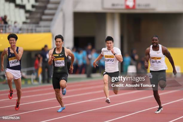 Ryohei Tada of Japan, Ryota Yamagata of Japan, Yoshihide Kiryu of Japan and Justin Gatlin of the United States compete in the Men's 100m during the...