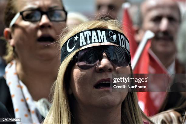 Woman chants slogans during a demonstration staged by the main opposition Republican People's Party , protesting the state of emergency on the first...