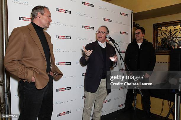 The Hollywood Reporter publisher Eric Mika, Focus Features CEO/Indie Icon Award recipient James Schamus and Sundance Film Festival Director John...