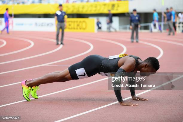 Isaac Makwala of Botswana performs push-ups after winning the finish line to win the Men's 200m during the IAAF Golden Grand Prix at Yanmar Stadium...