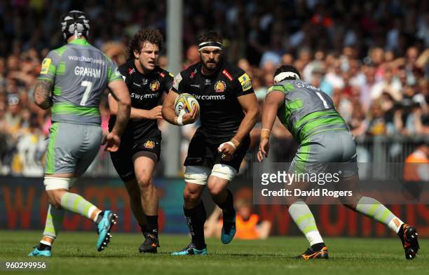 Don Armand of Exeter takes on Sam Lockwood during the Aviva Premiership Semi Final between Exeter Chiefs and Newcastle Falcons at Sandy Park on May...