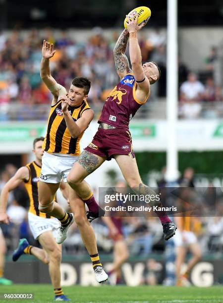 Mitch Robinson of the Lions takes a mark during the round nine AFL match between the Brisbane Lions and the Hawthorn Hawks at The Gabba on May 20,...