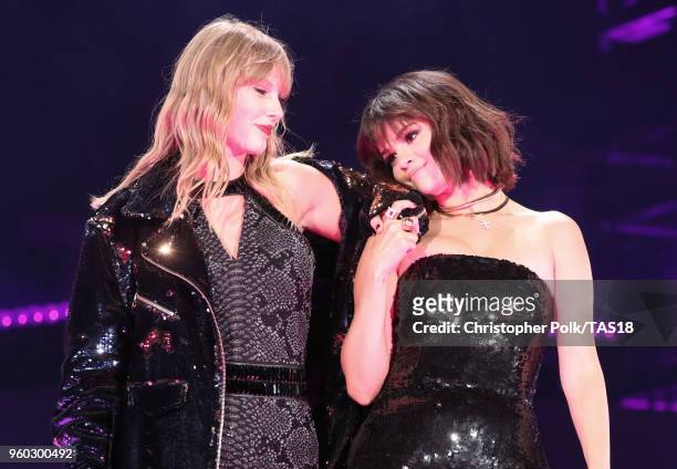 Taylor Swift and Selena Gomez perform onstage during the Taylor Swift reputation Stadium Tour at the Rose Bowl on May 19, 2018 in Pasadena, California