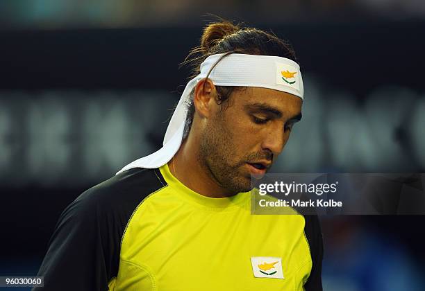 Marcos Baghdatis of Cyprus looks on between points in his third round match against Lleyton Hewitt of Australia during day six of the 2010 Australian...