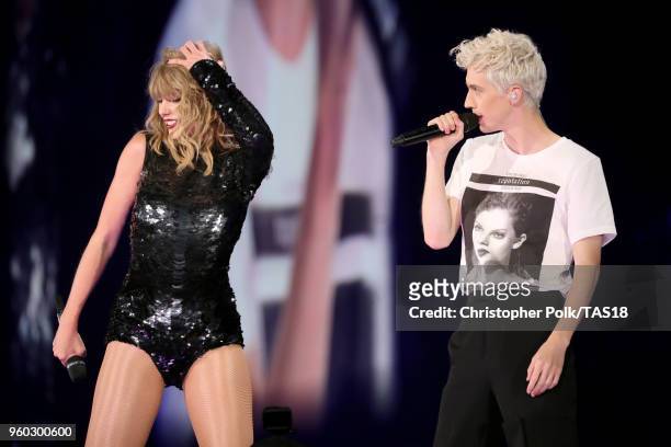 Taylor Swift and Troye Sivan perform onstage during the Taylor Swift reputation Stadium Tour at the Rose Bowl on May 19, 2018 in Pasadena, California