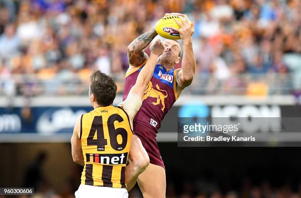 Mitch Robinson of the Lions takes a mark during the round nine AFL match between the Brisbane Lions and the Hawthorn Hawks at The Gabba on May 20,...
