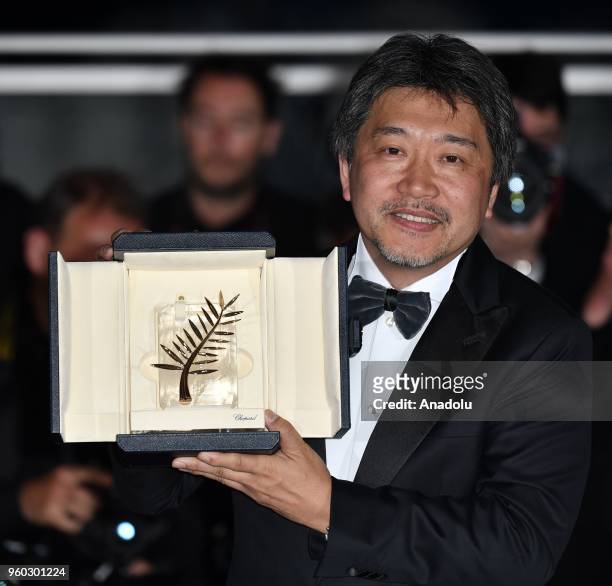 Japanese director Hirokazu Kore-eda poses during the Award Winners photocall after winning the Palme d'Or award for 'Shoplifters' at the 71st Cannes...