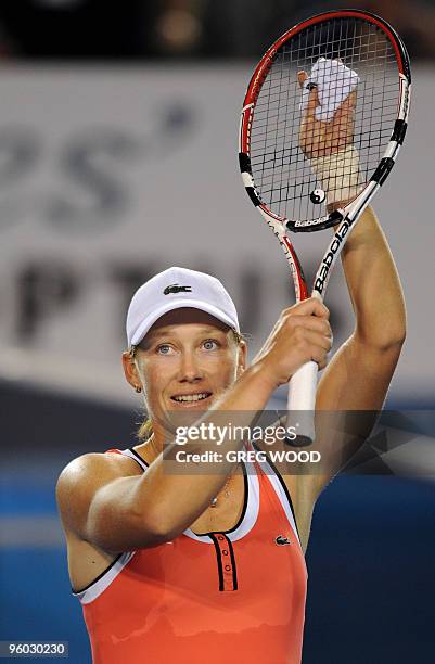 Samantha Stosur of Australia waves to the crowd as she celebrates her victory over Alberta Brianti of Italy in their women's singles third round...