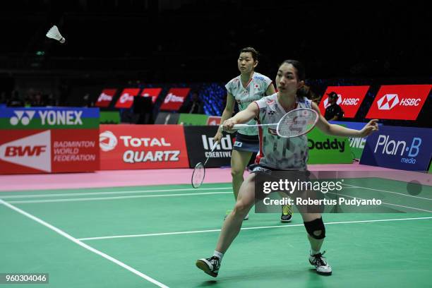 Misaki Matsutomo and Ayaka Takahashi of Japan compete against Lee Yen Khoo and Ann Louise Slee of Australia during qualification match on day one of...