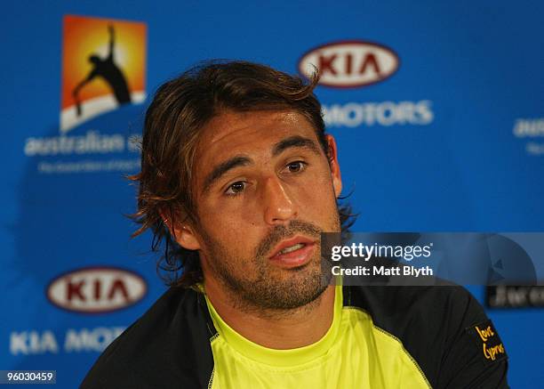 Marcos Baghdatis of Cyprus talks to the media at a press conference after retiring from his third round match against Lleyton Hewitt of Australia...