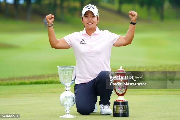 Hee-Kyung Bae of South Korea poses with the trophy after winning the Chukyo TV Bridgestone Ladies Open at Chukyo Golf Club Ishino Course on May 20,...