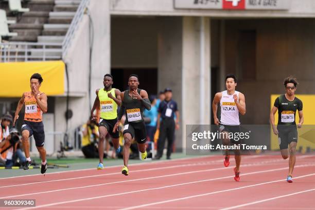 Xie Zhenye of China, Jarrion Lawson of the United States, Isaac Makwala of Botswana, Shota Iizuka of Japan and Kenji Fujimitsu of Japan compete in...