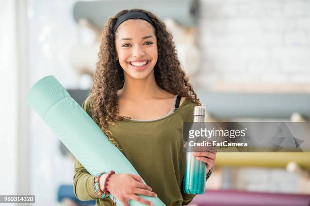 yoga equipment potrait - teenager yoga stock pictures, royalty-free photos & images