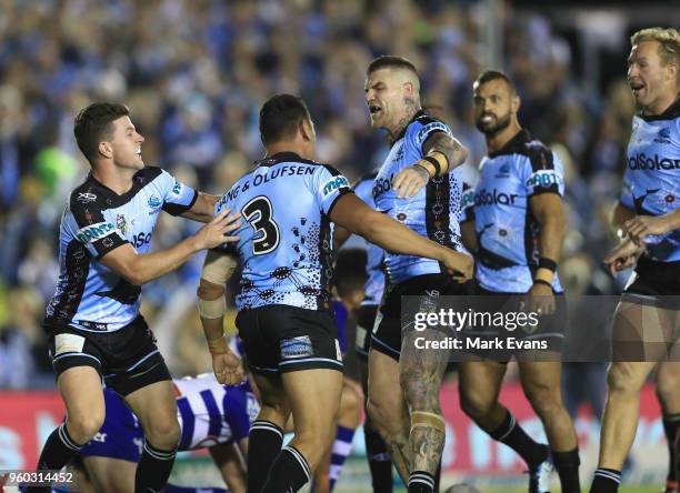 Sharks players celebrate a Jesse Ramien try during the round 11 NRL match between the Cronulla Sharks and the Canterbury Bulldogs at Southern Cross...