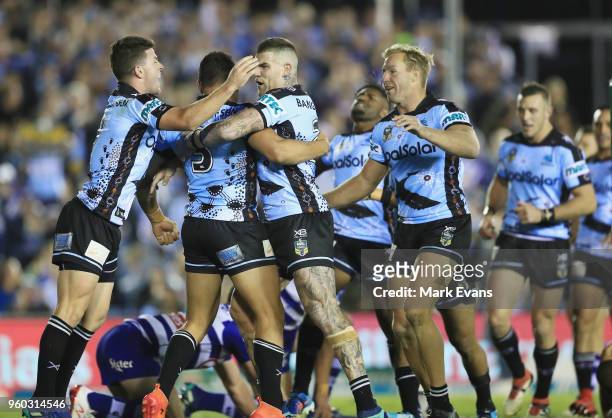 Sharks players celebrate a Jesse Ramien try during the round 11 NRL match between the Cronulla Sharks and the Canterbury Bulldogs at Southern Cross...