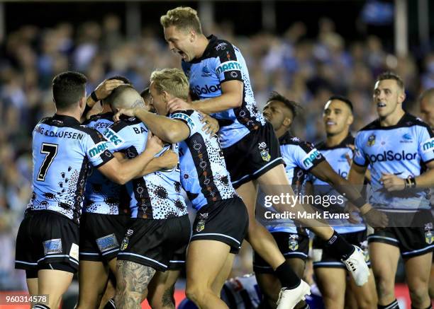 Sharks players celebrate a Jesse Ramien try during the round 11 NRL match between the Cronulla Sharks and the Canterbury Bulldogs at Southern Cross...