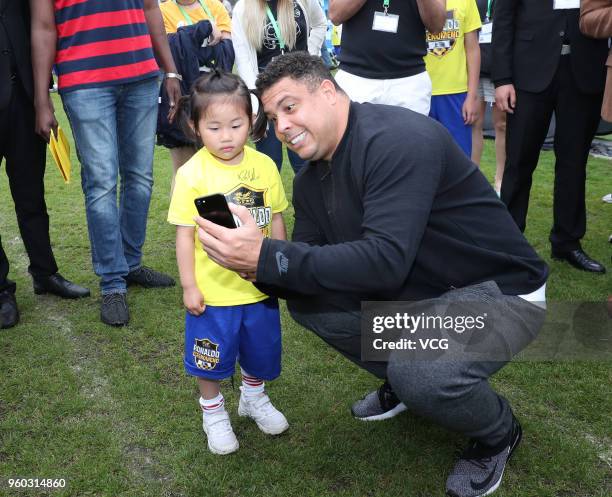 Retired Brazilian footballer Ronaldo Luis Nazario de Lima attends a soccer promotional activity on May 20, 2018 in Shanghai, China.