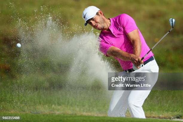 James Heath of England plays his shot out of the 6th green side bunker during his quater final match against Nicolas Colsaerts of Belgium during the...