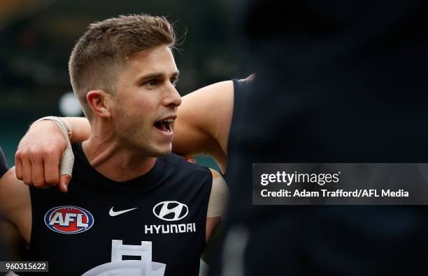 Marc Murphy of the Blues addresses his teammates during the 2018 AFL round nine match between the Carlton Blues and the Melbourne Demons at the...